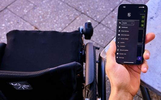 Hand showing Klaxon Twist R mobile phone compatibility