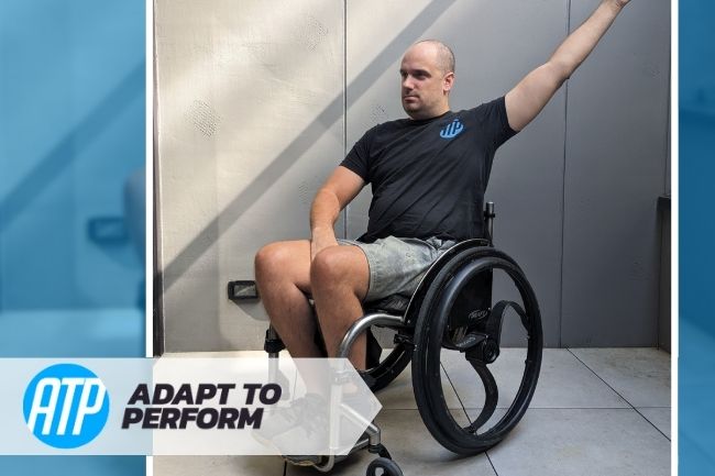 Stretching arms whilst using wheelchair