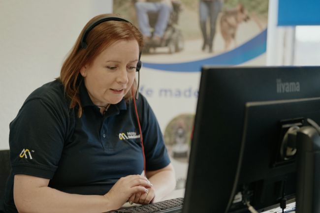 Mobility Solutions staff member answering call