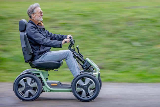 Man using mobility scooter outdoors