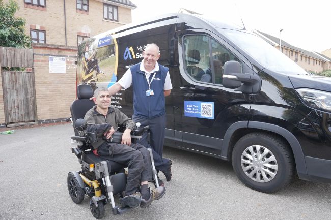 Mobility Solutions staff member with a happy customer