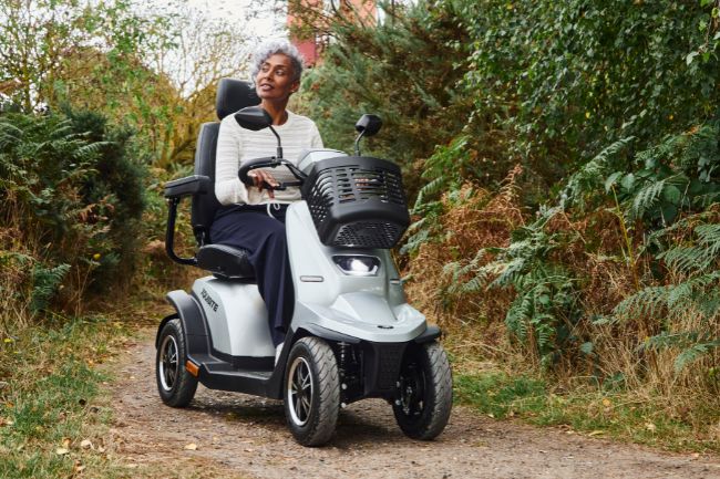 Woman using class 3 mobility scooter