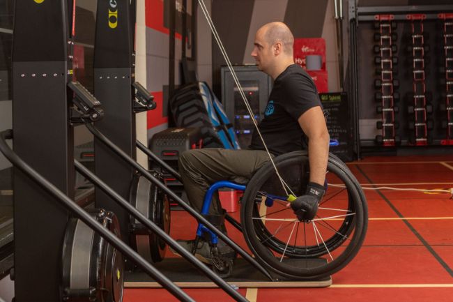 Ben from Adapt to Perform using exercise equipment