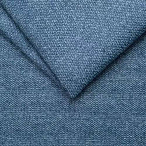 Two pieces of blue textured fabric are layered, with one piece folded diagonally over the other. The Dallux Nevis fabric showcases a subtle, woven pattern and a soft, matt finish.