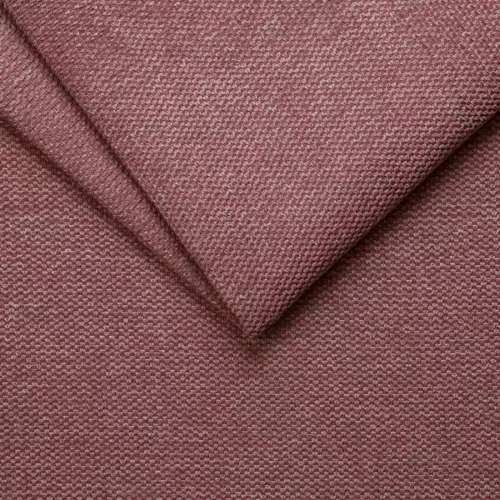 A close-up of a folded, textured fabric in a muted mauve colour, showing the woven material and detail of the cloth—a signature style reminiscent of Dallux Nevis craftsmanship.